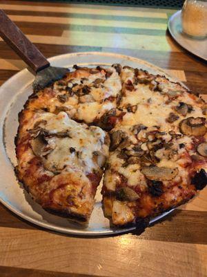 Personal pan pizza with mushrooms and sun dried tomatoes