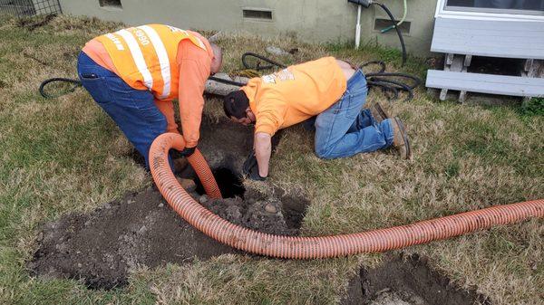 Alberto and Lucas working hard to pump out my septic tank!