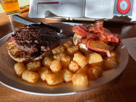 Black and Blue burger with tots.