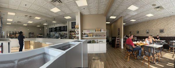 Interior of bakery.  Bathroom in the center hallway.  Clean.