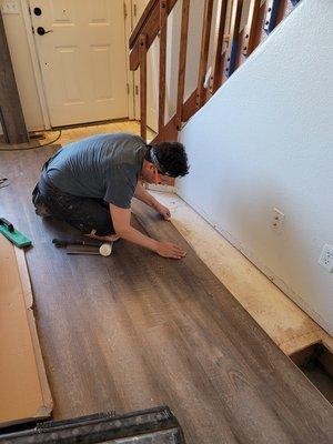 Enrique Hard At Work, Luxury Vinyl Plank in Castlerock!