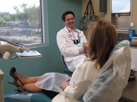 Dr. Gates visits with a new patient to our practice.