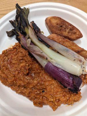 charred spring onions with cashew romesco sauce