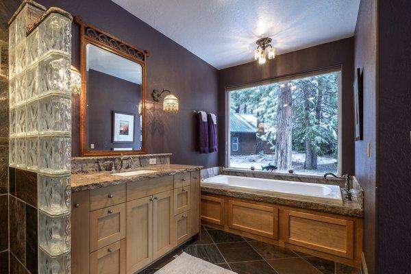 Opera Fantastico Marble Bathroom Vanity & Tub Deck. This project features back splash, a rock chip edge detail and an under mount sink.