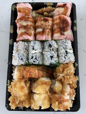 Lobster Tempura Sushi Roll (bottom) Philadelphia Sushi Roll (middle) Valentines roll (top)