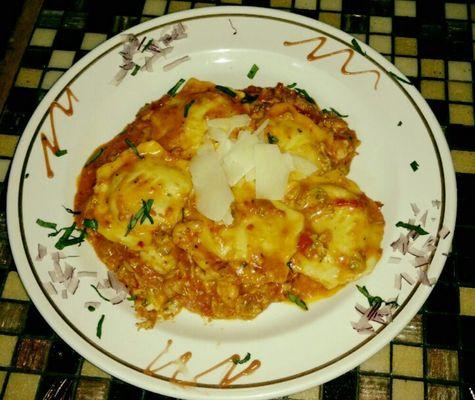 Lobster Ravioli with diced shrimp and baby clams dinner special