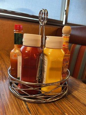 This condiment carousel must be removed and sanitized between customers-Betsy's policy.