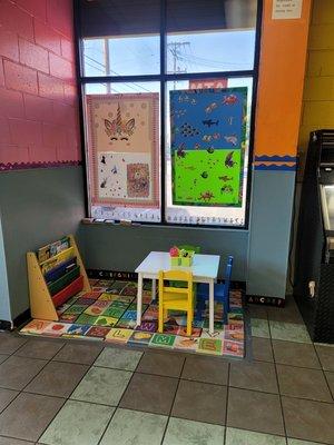 WE HAVE A KIDS SECTION SO YOU CAN RELAX AND WASH WHILE THE KIDS ARE ENTERTAINED BY READING OR COLORING