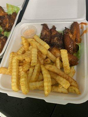 Mac Daddy's lemon pepper wings and season fries