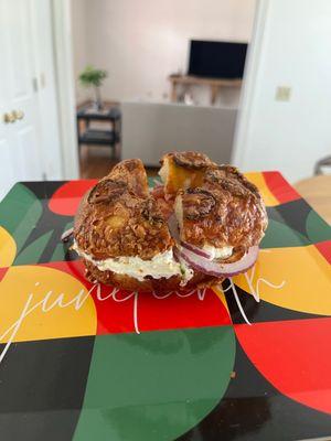 Jalapeño cheddar bagel w plain cc, tomato and onion