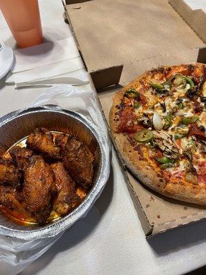 Spicy wings and supreme small pizza.