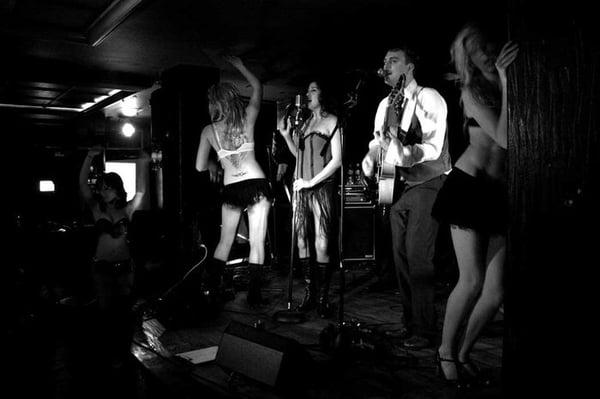 Wall of Tom with dancers for finale number on Tuesdays Speakeasy at Hush