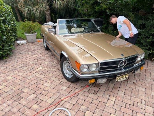 A handwax on a beautiful late 60's Mercedes.