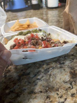 Super Nachos stuck to styrofoam and burned holes to the container