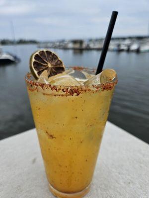 Mango Margarita- Olmeca Altos Tequila, Lime Juice, Sour Mix, Triple Sec, Mango Puree, Tajin Rim