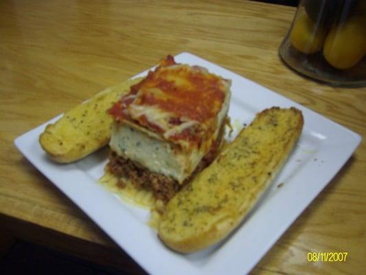 lasagna served with garlic bread