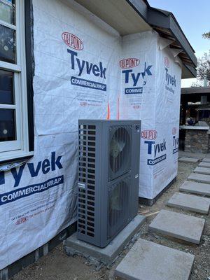 One of the three outdoor units. Side-yard space was at a premium, so we went with slim-line condensers to maximize our clearances.