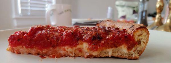 Chicago style deep dish pizza - side view