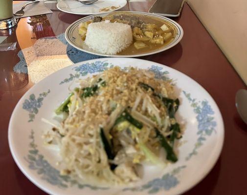 Chicken pad Thai and a beef mussuman curry yum