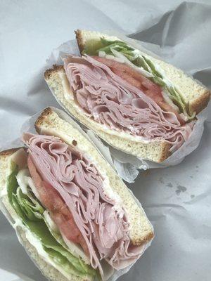 Ham and Swiss sandwich on white