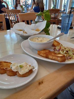 Fondue Cancun with cheese, baby clams, crab meat, scallops and shrimp served with toasted garlic bread and salad. $15.95