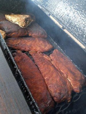 Pork spareribs, butts and brisket.