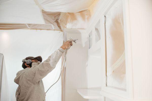 Spraying kitchen cabinets