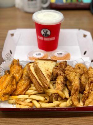 Tenders and wings with fries also a vanilla milkshake