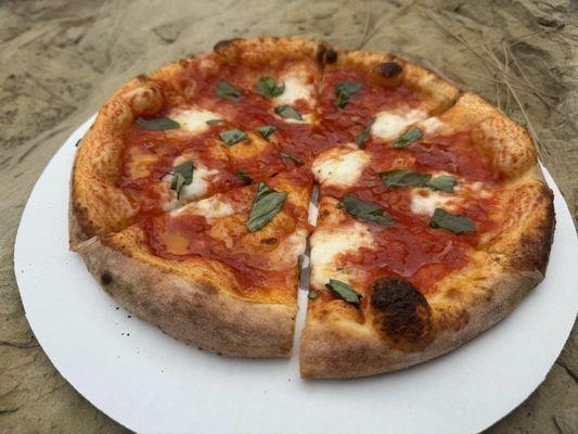 Margarita Pizza - Tomato sauce, fresh mozzarella, and fresh basil!