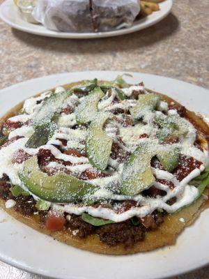 Huarache with chorizo. No rice and beans come with it, but it is SO GOOD and a very generous portion like everything else they have here!