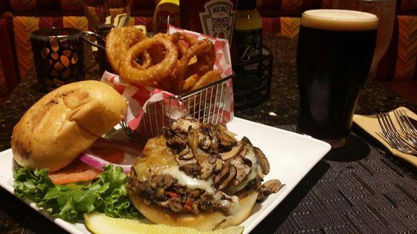 Black Bean and Rice Burger with onion rings and a pint of Sad Panda Brown Ale.