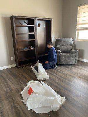 Putting our new bookshelves together!