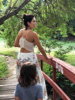 Adorable little bridge with a creek that runs through the park, kids loved that