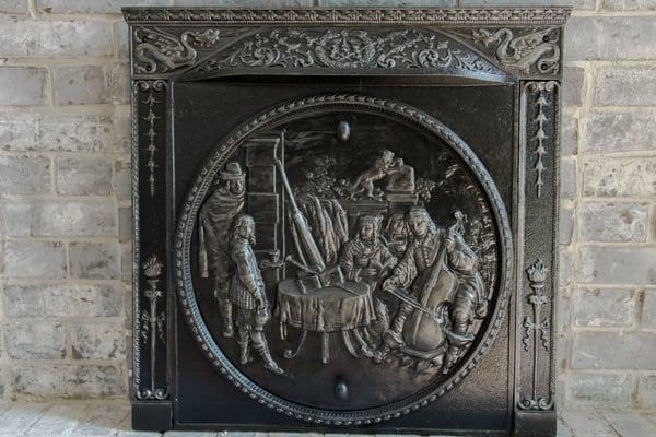 Completed restoration of the cast iron fireplace surround performed by Colonial Brass