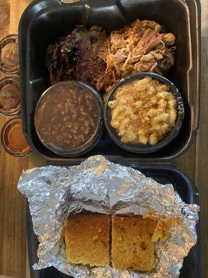 Meat sampler #2 meats Brisket , Pulled Chicken  Baked beans w/Brisket Cornbread  Mac & Cheese