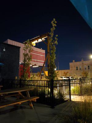 The dimly lit beer garden at night