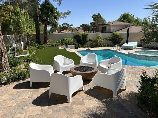 Fire pit overlooking pool