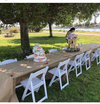 The white chair ,tables,and table cloth ( has so many options )