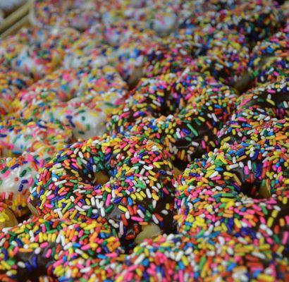 White and Chocolate iced donuts with sprinkles