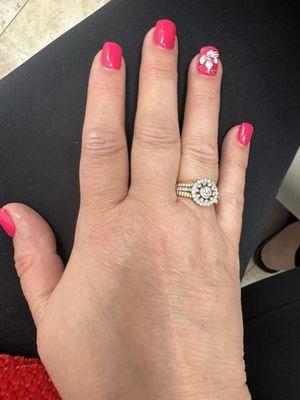 Pink nails with the white flower