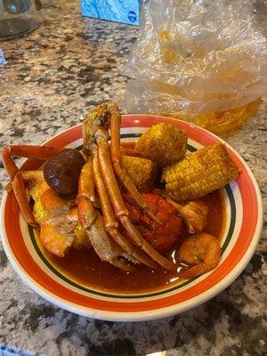 Red Bomb, crab, lobster, shrimp, potatoes & corn galore