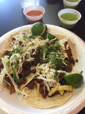 Tacos Al pastor..  Don't let the picture full you.  These are very small tacos.