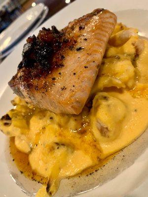 Maple bacon salmon on a bed of au gratin cauliflower.