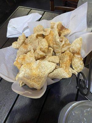 Complimentary pork rinds