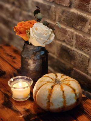 Fresh flowers and candles on each table