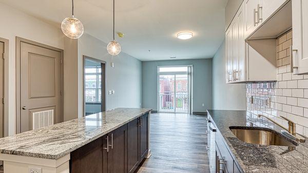 Pendant lighting accents large kitchen island