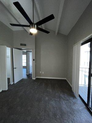 Vaulted Ceiling, newly renovated Master Bedroom and Private Patio equipped with automated Ceiling Fan