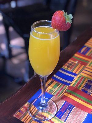 A delicious mimosa with their jungle juice