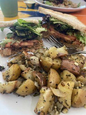 CBR sandwich. So so yummy. Jackfruit, mushroom, greens, tomatoes. The roasted potatoes were also super yummy. Highly recommend!