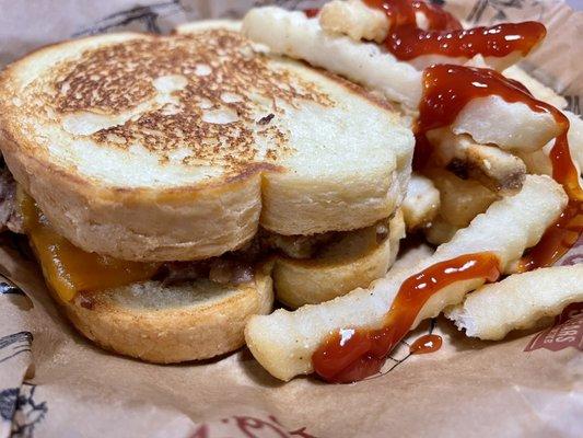 Brisket grilled cheese and crinkly fries.